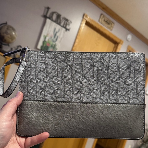 Calvin Klein Handbags - Calvin Klein Black and Gray Logo Clutch